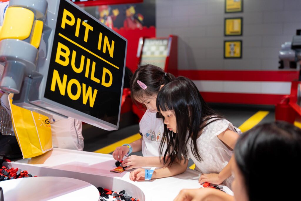 Kids Enjoying the LEGO® Ferrari Build & Race attraction