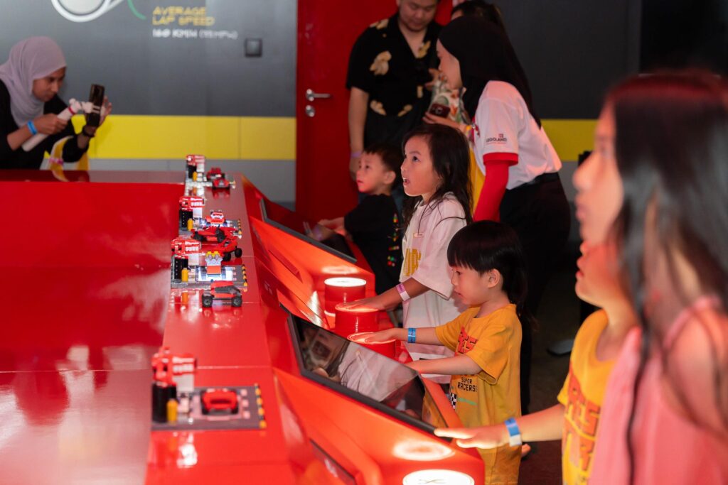Kids having fun at LEGO® Ferrari Build & Race attraction